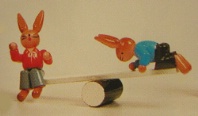 Rabbits on Teeter Totter